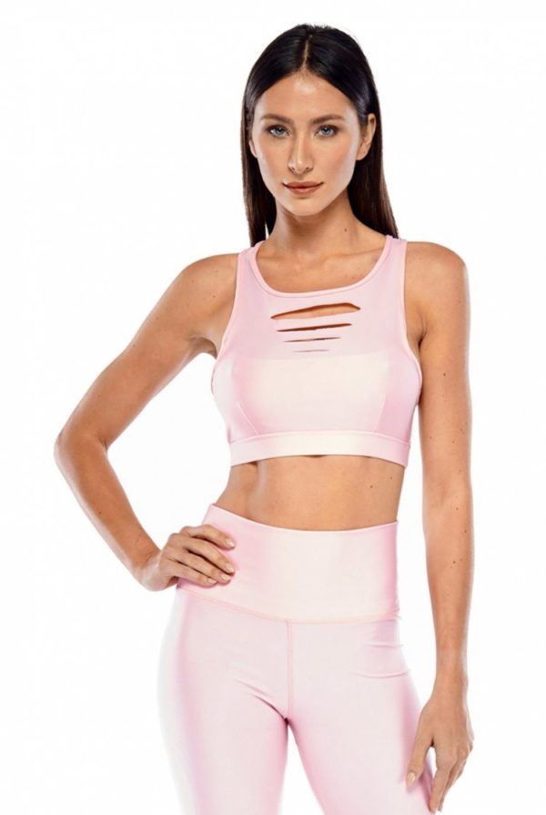 Featuring a Blush color, with a high-cut neckline, laser cut detailing, and a X-back strap design, this bra top is perfect for Yoga or the gym